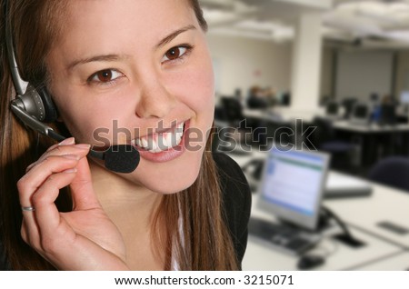 A pretty customer service woman taking sales over the phone