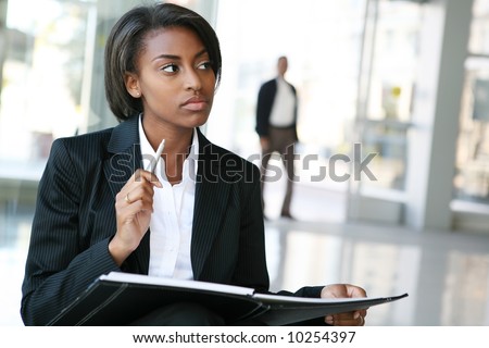 A pretty african american business woman at her company