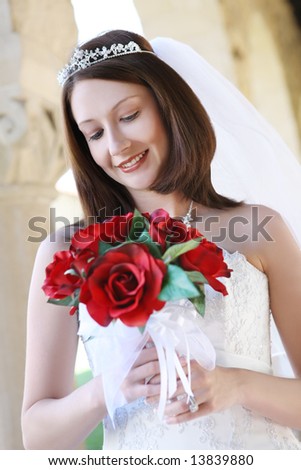 A young beautiful woman at her wedding inside church