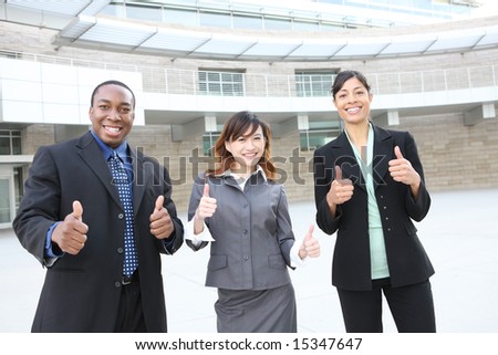 An attractive team of diverse business people at company office building