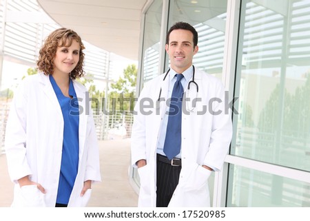 A successful man and woman medical team at hospital building