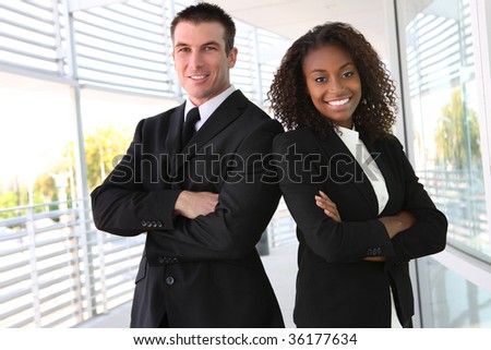 A diverse african and caucasian man and woman business team