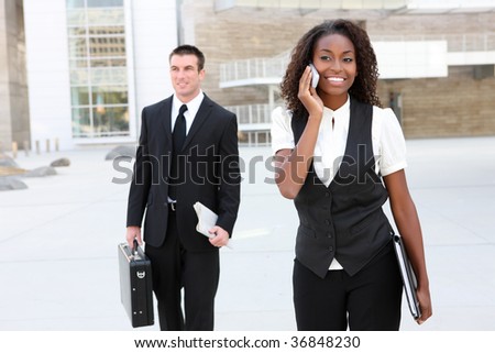 A diverse african and caucasian man and woman business team