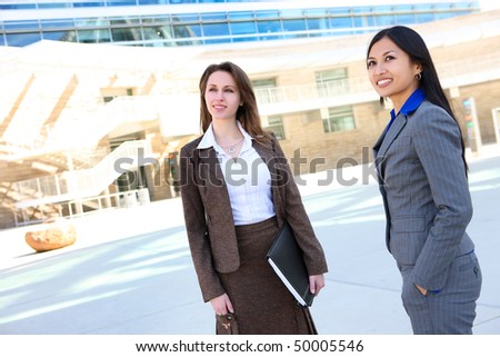 Young attractive business women team at office building
