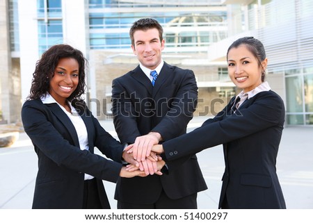 A diverse attractive man and woman business team at office building (Focus on Man)