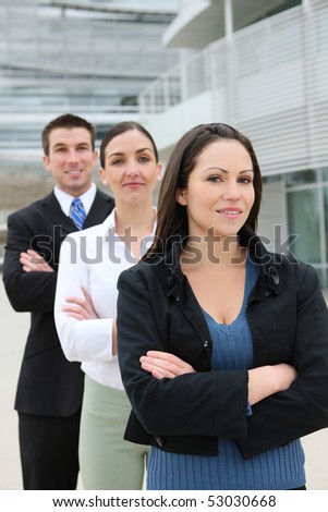 An attractive business man and woman team at office building