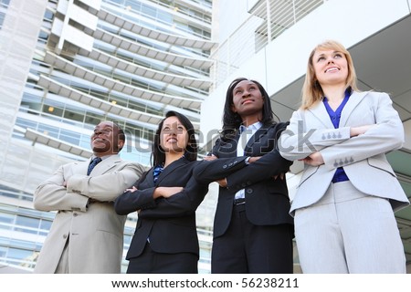 An attractive business man and woman team at office building diversity