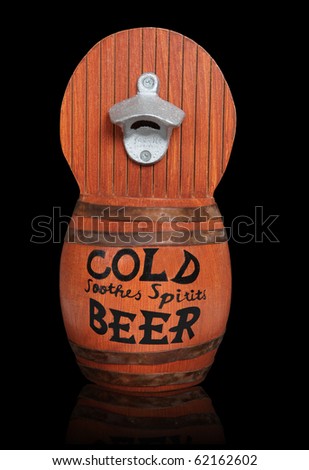 A wooden beer keg over a black background