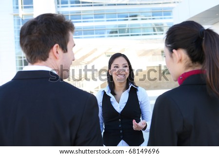 A  young business man and woman team at office building meeting