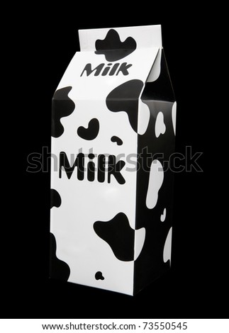 A milk carton with cow pattern over black background