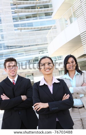 A diverse man and woman business team at office building