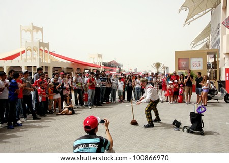 SHAKIR, BAHRAIN - APRIL 20: A clown performs at Formula 1 village, vending area & entertainment in 2012 Formula 1 Gulf Air Bahrain Grand Prix on April 20, 2012 in Shakir, Bahrain