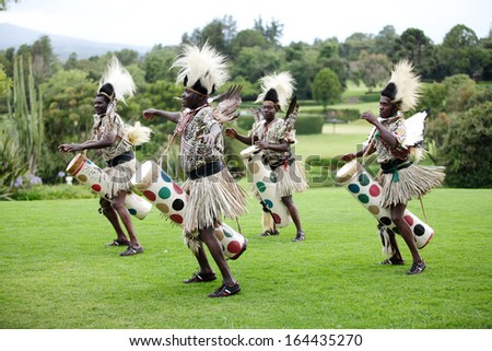 NANYUKI, KENYA-OCTOBER 17: A group of people performs African traditional folk dance at Mount Kenya Safari Club, Nanyuki,  Kenya on October 17, 2013