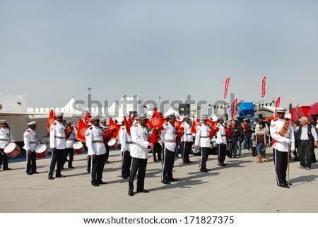 SAKHIR AIRBASE, BAHRAIN- JANUARY 17: Police band performs in the public area during Bahrain International Airshow at Sakhir Airbase, Bahrain on 17 January, 2014