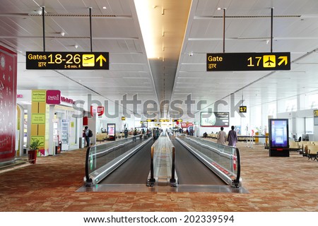 NEW DELHI, INDIA-MAY 30: Beautiful departure lounge of New Delhi International Airport with travelator in the middle on May 30, 2014, New Delhi, India