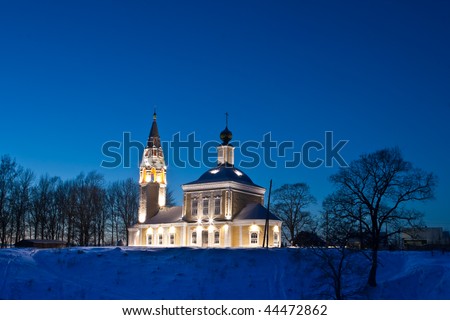 Highlighted church in early winter twilight