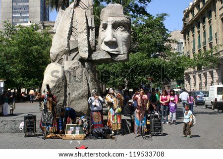 SANTIAGO, CHILE-NOV.2:  Mapuche Indians, an ethnic minority in Chile comprising less than 4% of the population, perform native music at Plaza de Armas on November 2, 2012 in Santiago, Chile.