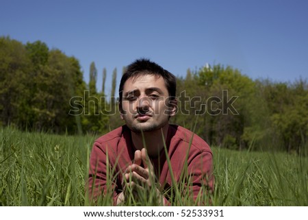 Young man in the middle of nature
