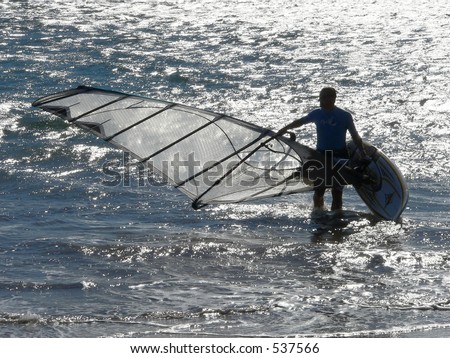 Tired windsurfer at end of a good day at Maui\'s southshore