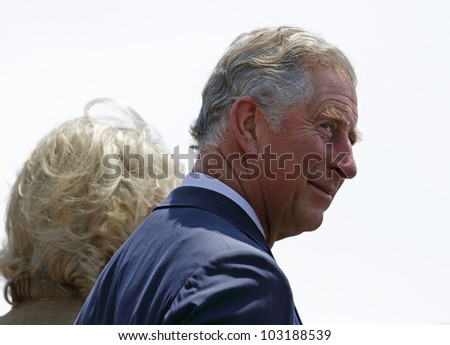 SAINT JOHN, CANADA - MAY 21: Charles, Prince of Wales, takes part in a ceremony at the Marco Polo cruise terminal with Camilla, Duchess of Cornwall, on May 21, 2012, in Saint John, Canada.
