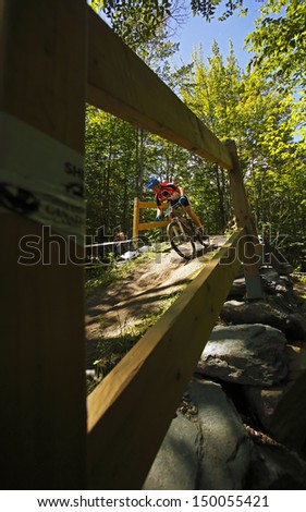 SHERBROOKE, CANADA - August 5: Massey Baker competes in men\'s mountain biking at the Canada Games August 5, 2013 in Sherbrooke, Canada.