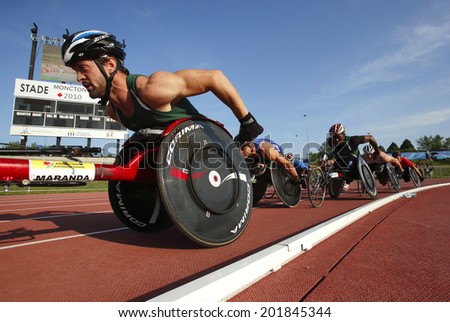 MONCTON, CANADA - June 28: Jean-Philippe Maranda leads the pack in the men\'s 1500-metre wheelchair at the Canadian Track & Field Championships June 28, 2014 in Moncton, Canada.