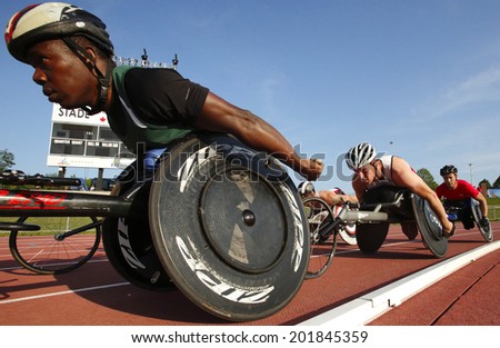 MONCTON, CANADA - June 28: Basile Niamba Soulama (left) competes in the men\'s 1500-metre wheelchair at the Canadian Track & Field Championships June 28, 2014 in Moncton, Canada.
