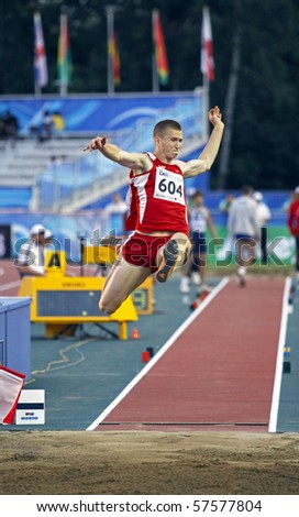 MONCTON, CANADA - JULY 20: Nikita Pankins of Latvia (LAT) performs the long jump during the 2010 IAAF World Junior Championships on July 20, 2010 in Moncton, Canada.