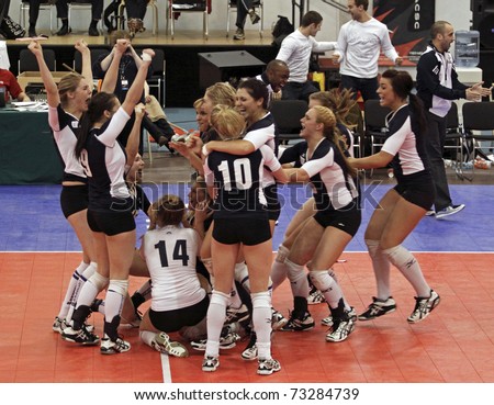 SAINT JOHN, CANADA - MARCH 12: Mount Royal University celebrates their gold win versus Vancouver Island University at the CCAA women\'s volleyball nationals March 12, 2011 in Saint John, Canada.