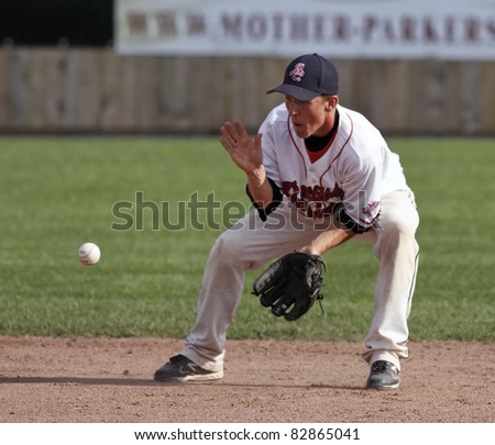 MONCTON, CANADA - AUGUST 14: Shortstop Joshua Croft of British Columbia fields a grounder at the 2011 Baseball Canada Cup August 14, 2011 in Moncton, Canada.