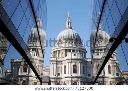 St Pauls Cathedral reflected in glass walls of One New Change in London