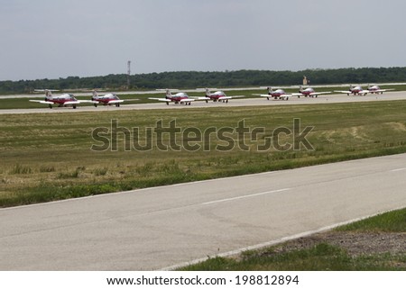 ROCKFORD, IL - JUNE 7: Royal Canadian Air Force Snowbirds jet airplanes demonstrate flying skills and aerobatics at the annual Rockford Airfest on June 7, 2014 in Rockford, IL