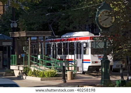 Salt Lake City, Utah, a view of the trolley station and a town clock