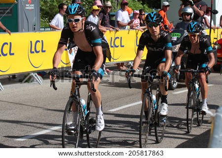 CHAMROUSSE, FRANCE, JULY 18, 2014 : Team Sky runners lead australian champion Ritchie Porte in Chamrousse stage of Tour de France. Tour de France is the biggest professional cycling race in the world.