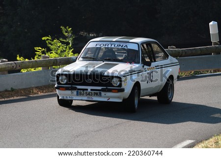 LIMONEST, FRANCE, SEPTEMBER 27, 2014 : Old car trains uphill in Mont-Verdun, last stage of Coupe de France of Historic Vehicles.
