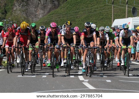 PIERRE SAINT-MARTIN, FRANCE, July 14, 2015 : The gruppetto in the last climb of the 10th stage of Tour de France. Grupetto is the name given to a large group behind the leading peloton.