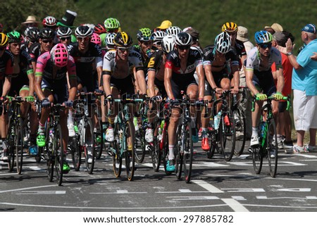 PIERRE SAINT-MARTIN, FRANCE, July 14, 2015 : The gruppetto in the last climb of the 10th stage of Tour de France. Grupetto is the name given to a large group behind the leading peloton.