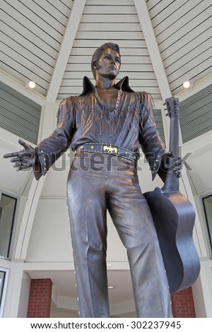 MEMPHIS, TENNESSEE, May 12, 2015 : Big statue of Elvis at Tennessee Tourism Office in Memphis. Regarded as one of the most significant cultural icons of 20th century, Elvis is often called \