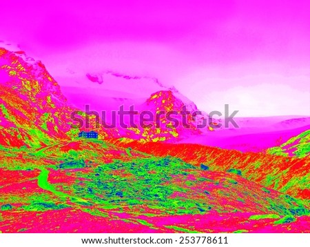 Spring in Alpine mountains in infrared photo. Mountain hotel in hilly landscape. Sunny weather with clear sky above. Amazing thermography colors.