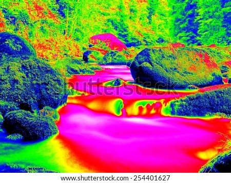 Mountain river in infrared photo. Amazing thermography. Boulders and water level in shadows of trees.