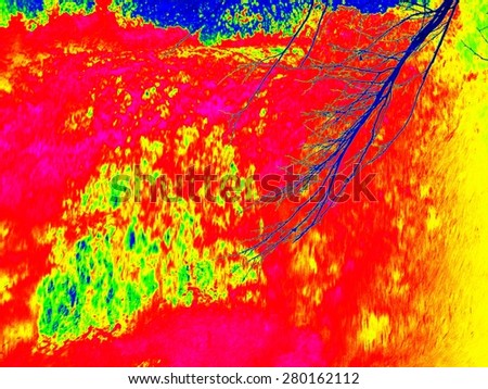 Foamy water of waterfall, looks like hot magma. Freeze water of mountain river in infrared photo. Amazing thermography.
