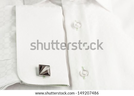 Cuff link on formal white shirt
