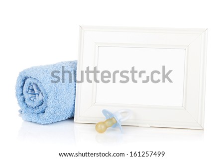 Photo frame with bath towel and boy dummy. Isolated on white background