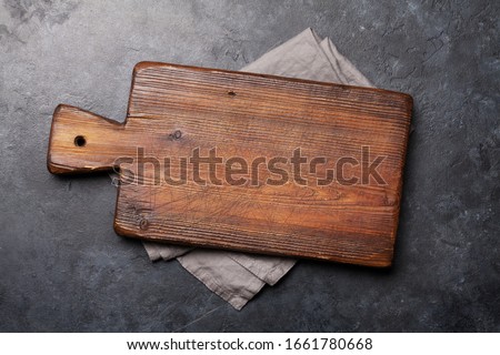 Similar – Image, Stock Photo Over the wooden table, children’s hands are holding delicious cupcakes