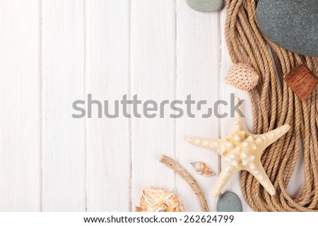 Summer time sea vacation background with star fish and marine rope