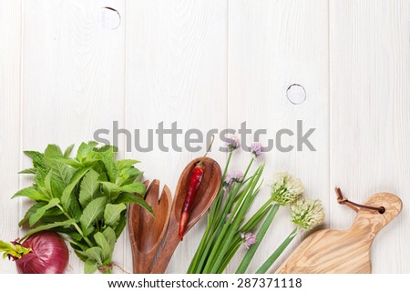 Fresh herbs and spices on garden table. Top view with copy space