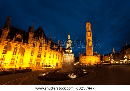 A moody night sky above Grote Markt, the city center of Brugges, Belgium