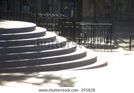Circular concrete steps outside a building, Paris, France,