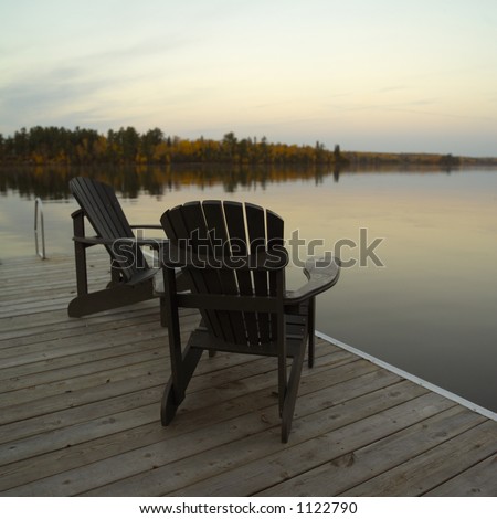 Two Adirondack Chairs on Dock