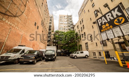 NEW YORK - JUNE 22: parking lot in Greenwich Village on June 22, 2014 in New York. Greenwich Village, also known as \